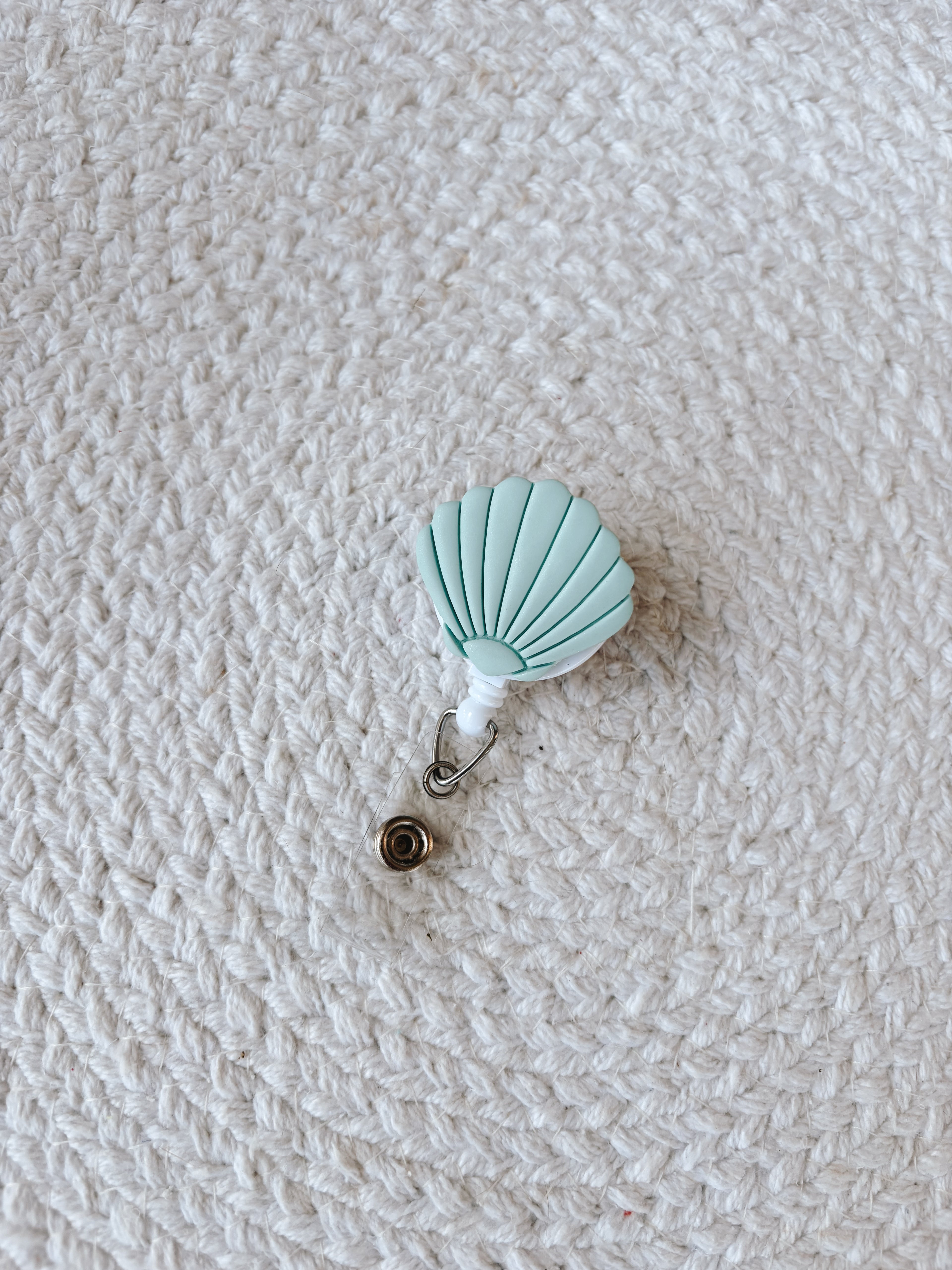 Shell Badge Reel
